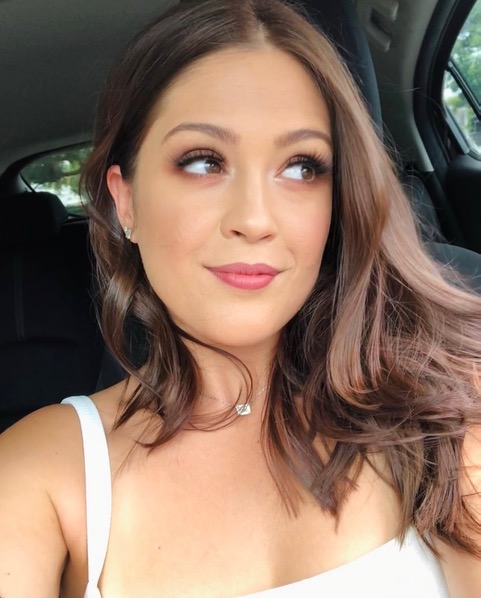 Wedding guest makeup and brown wavy hair, styled by De Ross Artistry
