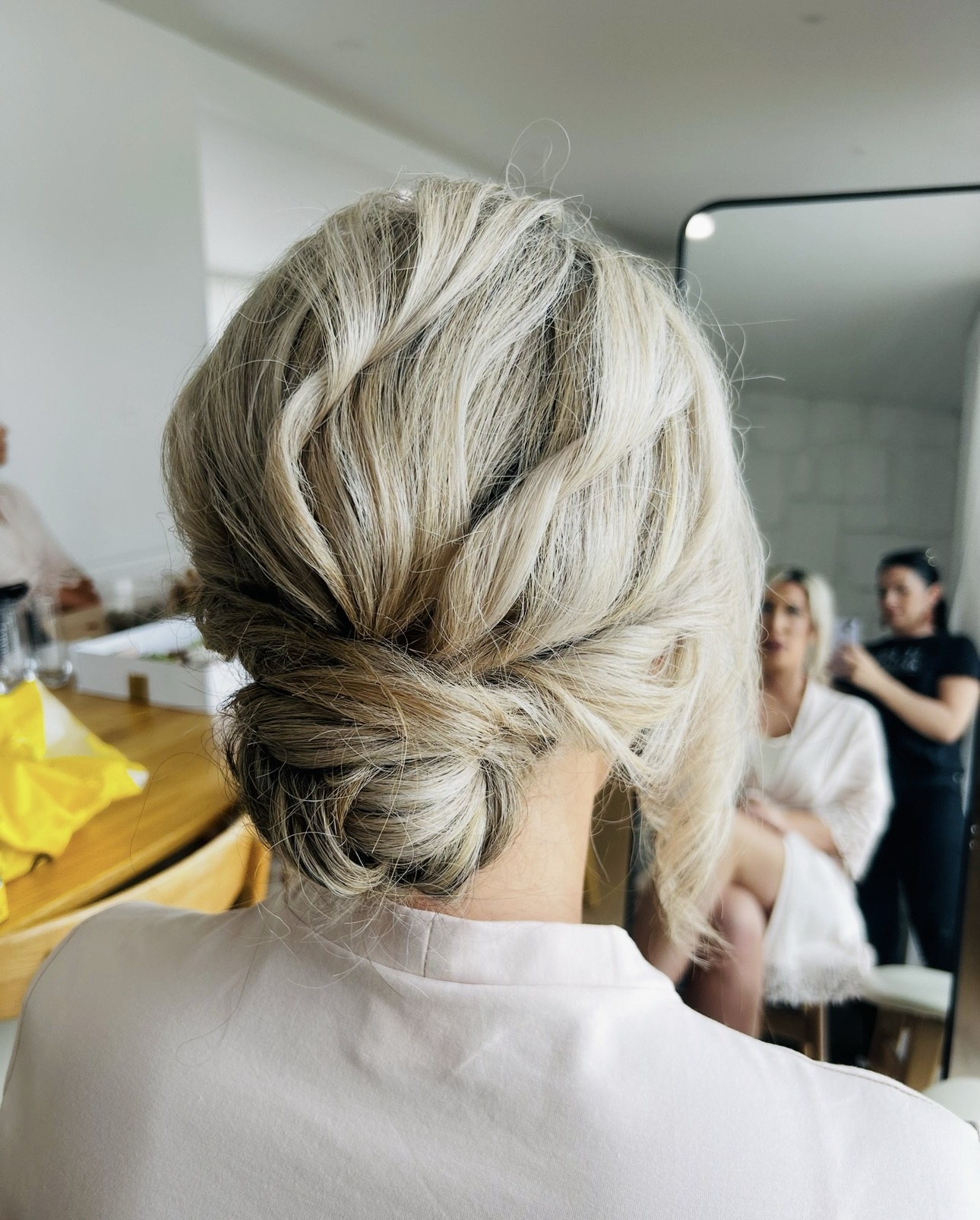 Textured low bun Hairstylye by Tania de Ross